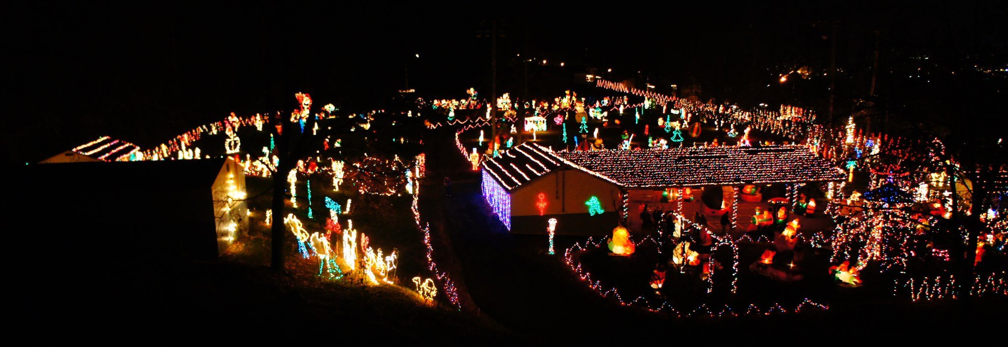 Wide view across the colorful Christmas on the Mountain display at Hillside Playground